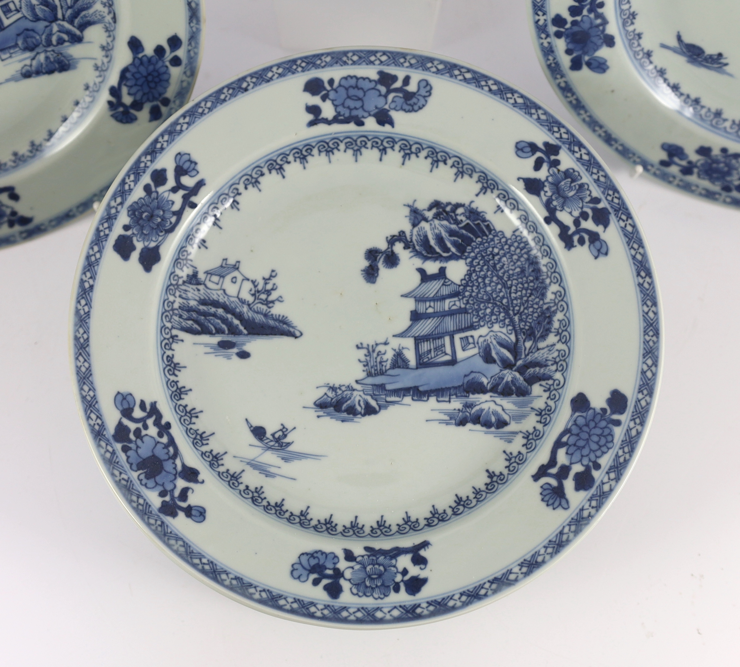 Ten Chinese blue and white ‘Boatman and Six flower border’ plates, Nanking Cargo, c.1750